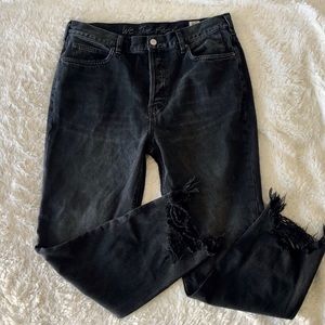 Distressed dark grey denim jeans